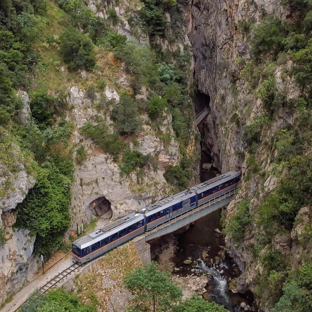 The narrowest part of Vouraikos gorge at Geosite no 2 - Portes. 
The famous Odontotos Rack railway Diakopto-Kalavryta crosses the steep slopes of the limestone.
▶️ learn about the #chelmosvouraikosgeopark geosites
#chelmosvouraikosnationalpark 
#unescoglobalgeopark

📷@socratistsacos